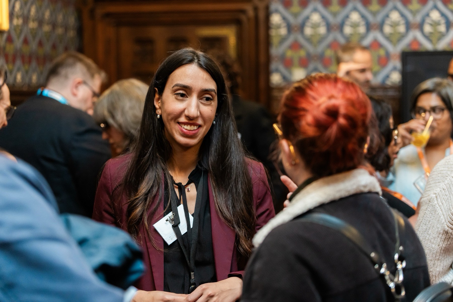 Amani attending a Parliamentary reception with networking